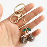 Darrahopens Gift & Novelty > Novelty > Novelty Gifts 2 Pcs Brown rugby ball shape Creative Sports Ball Cherry Keychain – Cute Resin Charm for Car Keys, Bags & Backpacks