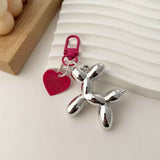 Darrahopens Gift & Novelty > Novelty > Novelty Gifts 2-Piece Silver Balloon Dog Keychain Set with Heart Charm Bag Pendant Cute Couple Gift(Rose red button)