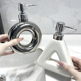 Darrahopens Health & Beauty > Bath & Body > Body Wash & Hand Soap Modern Ceramic Soap & Lotion Dispenser - Unique Geometric Designs, 300ml Capacity(Triangular lotion bottle, silver)