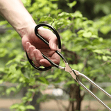 Darrahopens Home & Garden > BBQ > BBQ Tools Long, sturdy, and heat-resistant charcoal tongs for grilling food. Made of stainless steel, these portable tongs are suitable for outdoor grilling, charcoal, and fire pits.