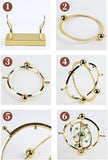 Darrahopens Home & Garden > Decor > Vases & Table Decor Celestial Orbit Perpetual Motion Pendulum, Kinetic Art Desk Decor 3D Space,Battery Powered Perpetual Motion Machine, Kinetic Art Desk Decor Science, Magnetic Balance Model for Home Or Office (Gold)
