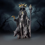 Darrahopens Home & Garden > Decor > Vases & Table Decor Dark Mystical Goddess Ornament — wearing a golden ray-like headdress, her face hidden beneath a dark robe, with a cross necklace adding to the mysterious aura. She holds a crescent moon prop in one hand and a flaming torch scepter tightly in the other.