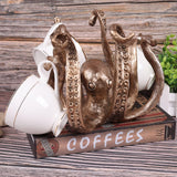 Darrahopens Home & Garden > Decor > Vases & Table Decor Multi-Functional Octopus Sculpture – Decorative Resin Cup Holder & Jewelry Organizer, Unique Home Accent for Living Room, Office, or Desk (Bronze)