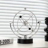 Darrahopens Home & Garden > Decor > Vases & Table Decor Newton's Cradle, an artistic craft piece for both home and office – a perpetual motion desktop ornament (requires 4 AA batteries to operate / batteries not included).