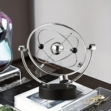 Darrahopens Home & Garden > Decor > Vases & Table Decor Newton's Cradle, an artistic craft piece for both home and office – a perpetual motion desktop ornament (requires 4 AA batteries to operate / batteries not included).