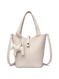 Darrahopens Home & Garden > Travel > Backpacks Beige Women's Small PU Leather Bucket Bag with Secure Lock and Horse Charm - 20cm Compact Crossbody Handbag for Everyday Use
