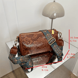 Darrahopens Home & Garden > Travel > Backpacks Brown Vintage Embossed Crossbody Barrel Bag with Wide Adjustable Guitar Strap