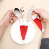Darrahopens Occasions > Christmas > Christmas Decorations Mini Santa Hat Cutlery Holders (100-Pack) - Festive Christmas Wine Bottle Toppers & Table Decorations