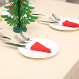 Darrahopens Occasions > Christmas > Christmas Decorations Mini Santa Hat Cutlery Holders (100-Pack) - Festive Christmas Wine Bottle Toppers & Table Decorations