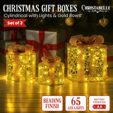 Darrahopens Occasions > Christmas > Outdoor Decorations & Lights Christabelle Set of 3 Battery Operated Golden Cylindrical Christmas Gift Boxes w/Warm LED Lights Indoor Holiday Present
