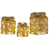Darrahopens Occasions > Christmas > Outdoor Decorations & Lights Christabelle Set of 3 Battery Operated Golden Cylindrical Christmas Gift Boxes w/Warm LED Lights Indoor Holiday Present