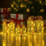 Darrahopens Occasions > Christmas > Outdoor Decorations & Lights Christabelle Set of 3 Battery Operated Golden Cylindrical Christmas Gift Boxes w/Warm LED Lights Indoor Holiday Present
